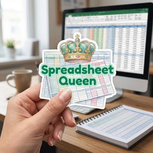 May include: A die-cut sticker featuring a watercolor illustration of a spreadsheet grid topped with an ornate teal and gold crown. The text "Spreadsheet Queen" is printed in bold green letters across the center of the grid design.