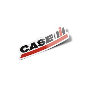 May include: A white sticker with the word "CASE" in black, outlined in white, and a red stripe. The sticker also features three vertical gray lines on the right side.