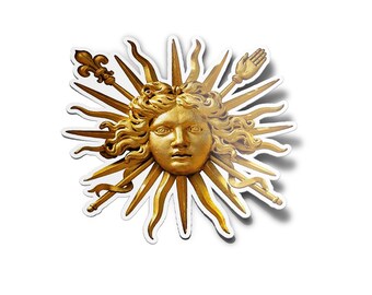 以下が含まれることがあります： 中央に人間の顔がある金色の太陽の光。太陽の光は中心から放射状に広がり、装飾的な要素で囲まれています。