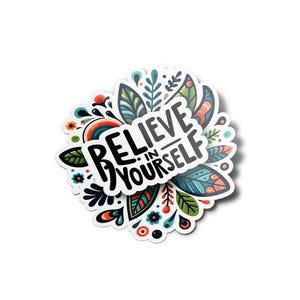 Peut inclure: Un autocollant coloré avec un motif floral et le texte "Crois en toi" en lettres noires.