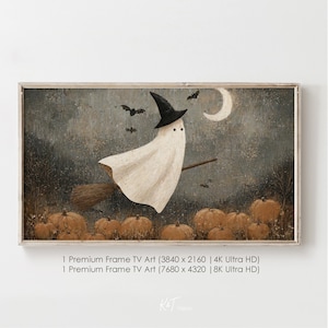 May include: A framed Halloween art print featuring a ghost in a witch's hat on a broomstick, with a crescent moon and bats. Pumpkins are in the foreground. The text at the bottom reads "1 Premium Frame TV Art".