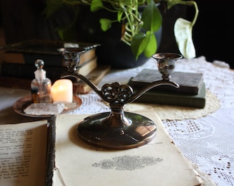 Portavelas antiguo de plata