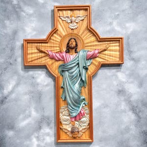 Wooden carved wall cross of the ascension of Jesus