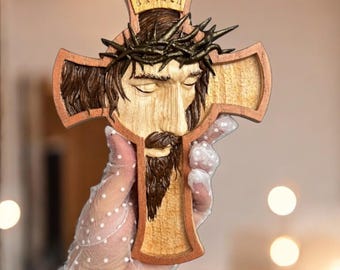 Face of Jesus Christ on the cross, wooden cross, manual artistic colouring
