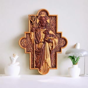 Wooden carved cross with the image of Jesus and the lamb