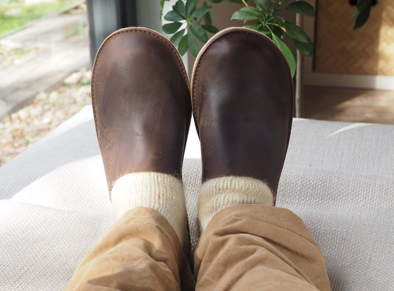 leather slippers being worn