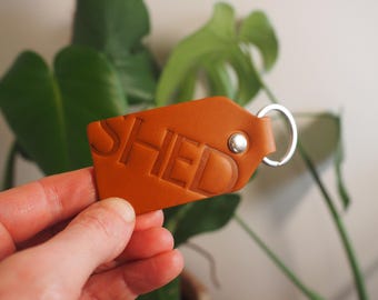 SHED branded leather key ring