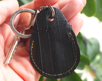 Air tag holder key fob made from recycled bicycle inner tube, christmas air tag