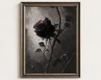 May include: A framed wall art print featuring a single dark, deep purple rose with visible thorns on its stem. The flower is set against a moody, clouded, and textured grey background, all enclosed within a dark, thin, rectangular wooden frame.