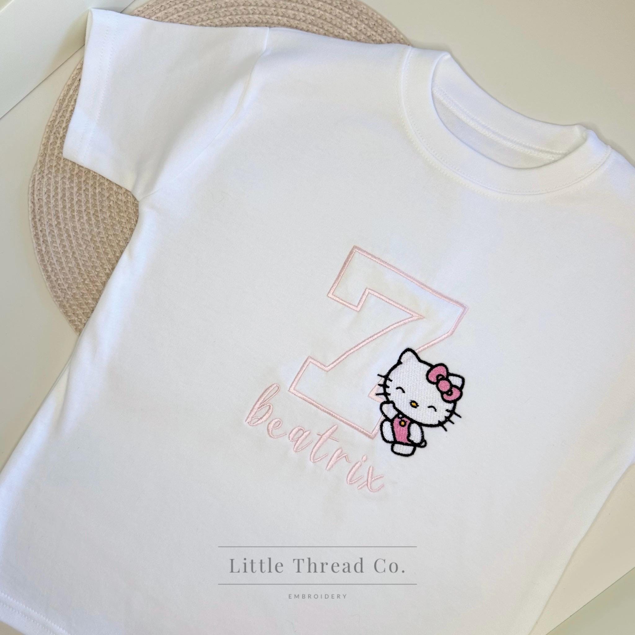 Hello Kitty Met Een Lollipop Meisjes T-Shirt Met Plooien