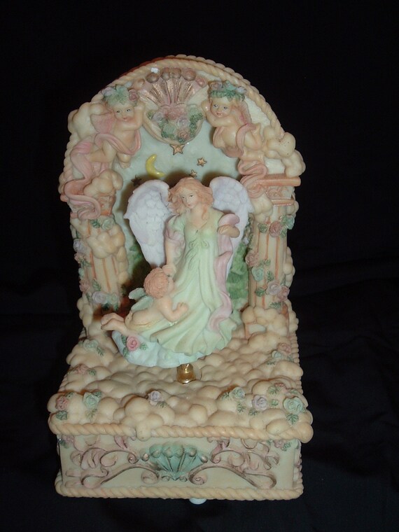 Items similar to Vintage Wind Up Porcelain Angel Music Box Plays Joy To