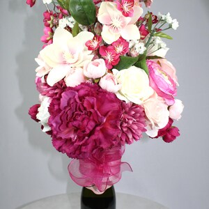 Pink Floral Wine Bottle Topper: Elegant Home Decor Arrangement