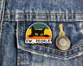 May include: A black cat peeking over a retro sunset with the text "EW, PEOPLE." on a denim jacket.