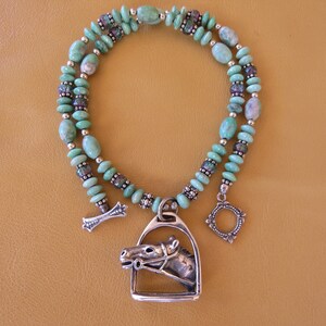 Sterling Silver Stirrup Pendant with Turquoise Beads