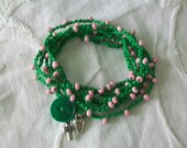 Wrap bracelet, Boho tribal, Multi layer, Stacking bracelet, Pink seed beads, Green crocheted fiber, Vintage button, Charm dangles