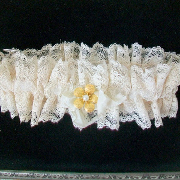 Brides garter  Wedding tradition  Reclaimed lace remake  Contemporary lace  Antique brooch embellishment