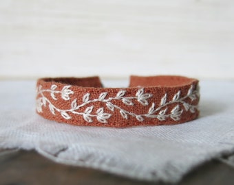 Hand Embroidered Linen Cuff Bracelet: Cream Floral Vine, Burnt Orange
