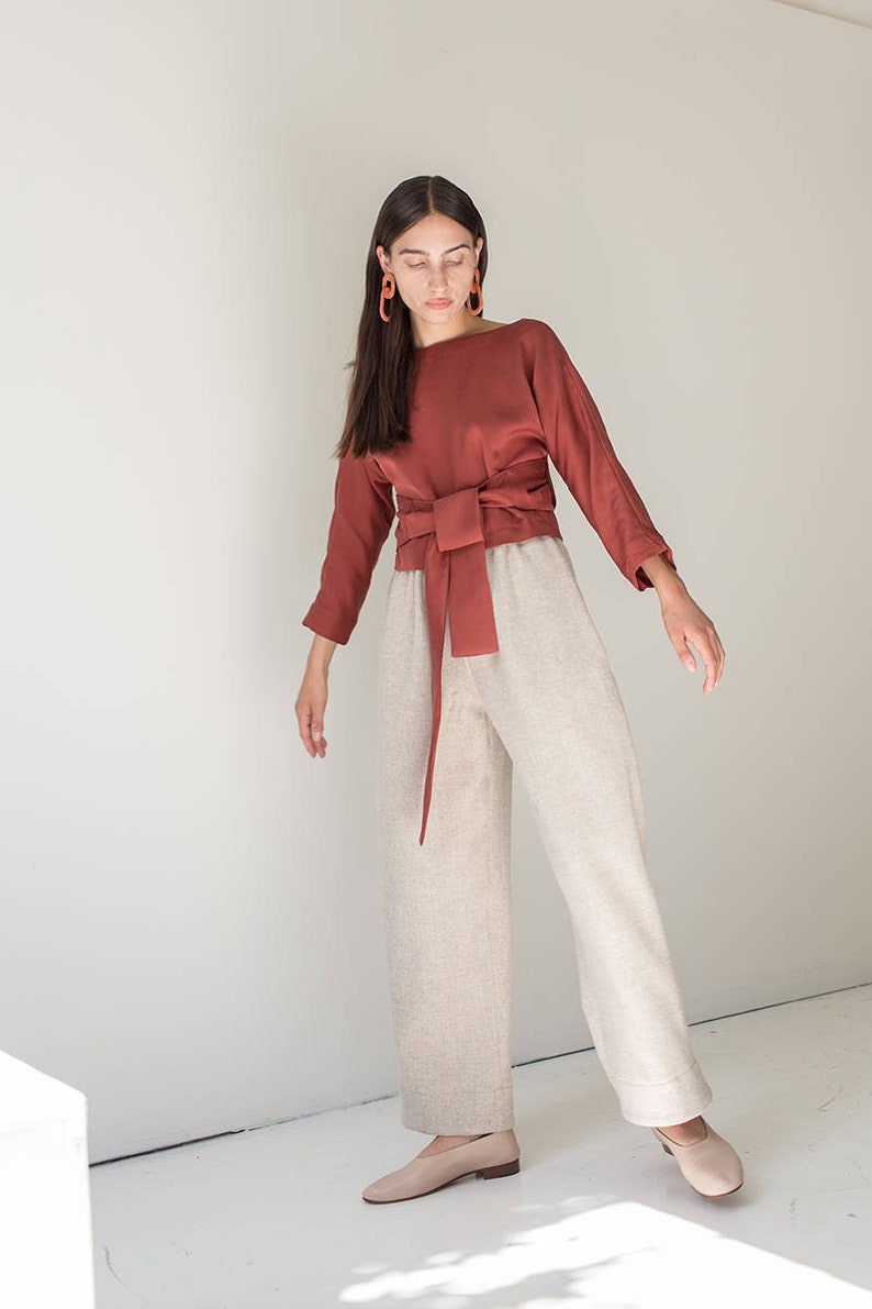 Classic wrap style top by with long sleeves by Lauren Winter. A few favorite Finalists for the Etsy Awards are spotlighted in this story with inspiring photos on Hello Lovely.