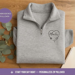 Personalized Nurse Quarter Zip Pullover Custom Name Embroidered Stethoscope Heart Design Healthcare Worker Gift Medical Professional Fleece Jacket Unisex Fit Comfortable Layer Over Scrubs Nurse Appreciation Present Birthday Gift Graduation