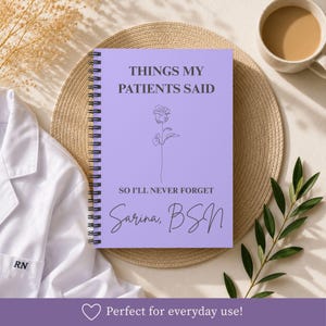 May include: A light purple spiral-bound notebook with black text that reads THINGS MY PATIENTS SAID, SO I'LL NEVER FORGET, and Sarina, BSN. The cover features a simple black line drawing of a single rose centred between the lines of text.