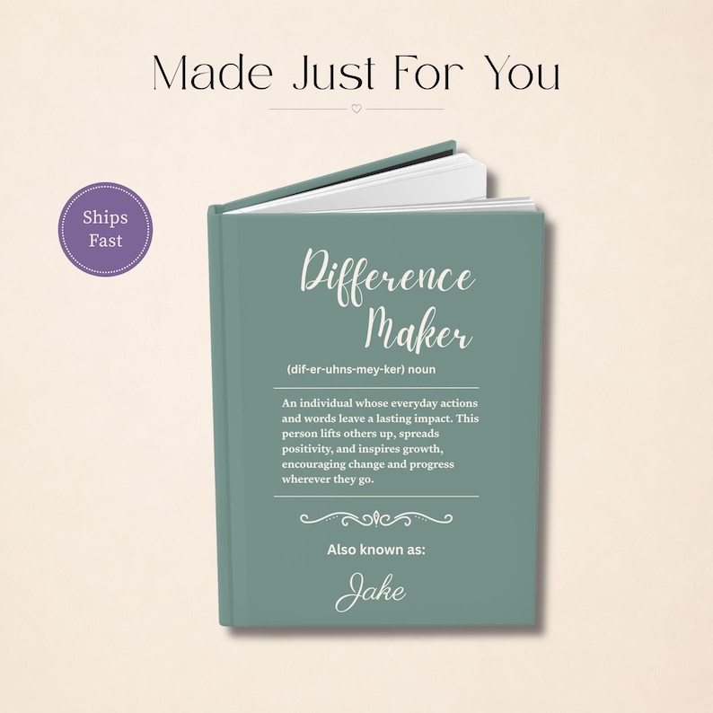 May include: A teal-colored journal titled "Difference Maker" with the definition of the term. The text includes "Also known as: Jake". The cover has a soft, matte finish. The words "Made Just For You" are at the top.