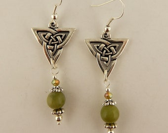 May include: Silver Celtic knot triangle earrings with green stone beads.