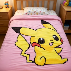 May include: A pink bedspread featuring a large, pixelated Pikachu design in yellow, black, and red. The bedspread is on a wooden bed frame with matching nightstands. The bedding set includes a pillow with a colorful pattern.