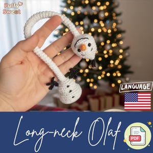 May include: A white crocheted Olaf-themed bookmark with a long neck, black twig arms, and a carrot nose. The bookmark has a smiling face and black hair. The text "Long-neck Olaf" is displayed on a blue background.