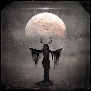 May include: A silhouette of a woman with antlers standing in front of a large, full moon. The woman is wearing a long, flowing dress and has her arms outstretched. The moon is a pale orange color and is surrounded by a dark sky.