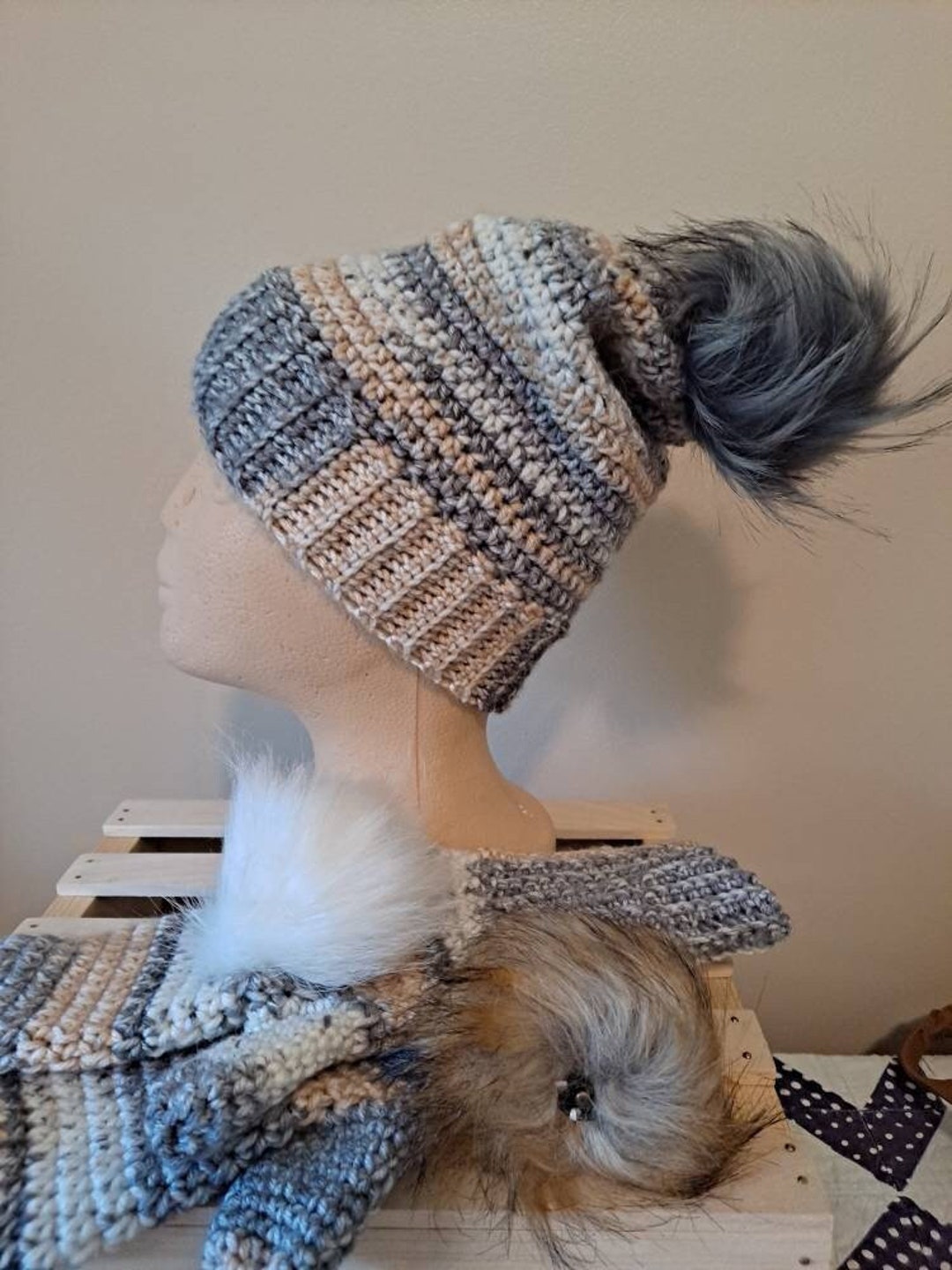 hat with interchangeable pom pom