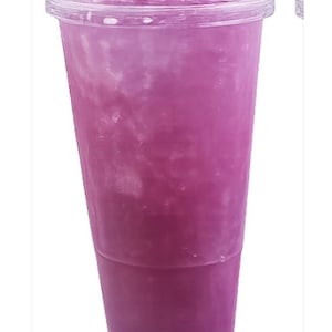 May include: A clear plastic tumbler filled with a vibrant purple liquid and ice cubes. The cup features a tapered cylindrical shape with a smooth surface and a matching clear plastic lid secured firmly on the top rim of the container.