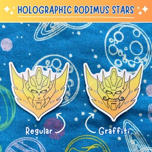 May include: Two holographic stickers with a yellow and orange gradient design. One sticker is labeled "Regular" and the other "Graffiti", with a mustache added. The text "HOLOGRAPHIC RODIMUS STARS" is at the top.
