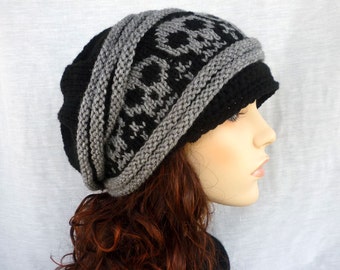 Unisex Slouch hat with skulls. Newsboy style in black and gray