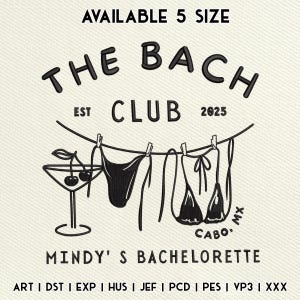 May include: Embroidered design with the text "THE BACH CLUB" above a clothesline with a martini glass and two bikinis. The text "MINDY'S BACHELORETTE" is below the clothesline. The text "CABO MX" is also included.