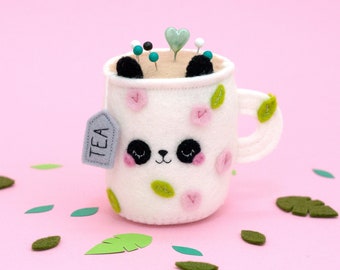 Coussin à épingles floral panda en tasse de thé