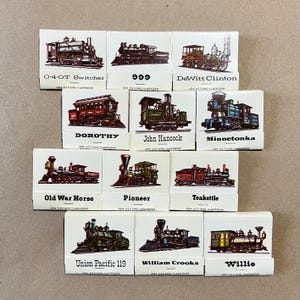 MATCHBOOKS, Trains - Lot of 12 vintage 1981 collectible match books unstruck souvenirs made by Ohio Match Company railroad collection fun