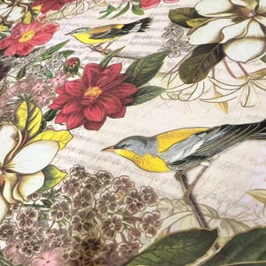 May include: A floral pattern featuring red, pink, and white flowers with green leaves and yellow birds. The background has musical notes. The birds have yellow, gray, and black feathers. The flowers are in full bloom.