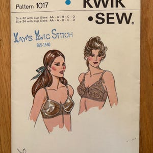 May include: Vintage Kwik Sew sewing pattern 1017 featuring illustrations of bras. The pattern includes cup sizes AA-D for sizes 32 and 34. The pattern is designed by Kerstin Martensson.