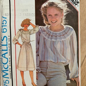 May include: Vintage McCall's 6157 sewing pattern for a Misses' dress or top. The pattern features a drawing of a woman wearing a striped dress with a tie waist and a woman wearing a striped top. The pattern includes the text "Quick & Easy" and "Carefree Pattern".