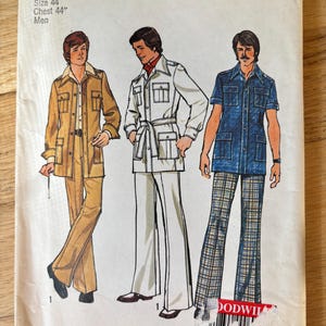 May include: Vintage Simplicity sewing pattern, size 44, featuring three men's outfits. The outfits include jackets, shirts, and pants in various styles and colors. The pattern cover is slightly worn, with the Simplicity logo at the top.