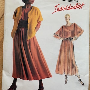 May include: Vogue Patterns Individualist sewing pattern for a dress and cardigan. The pattern is labelled "VERY EASY/TRÈS FACILE" and "1985".