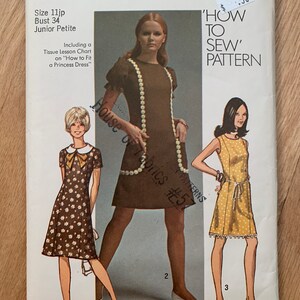 May include: Simplicity sewing pattern number 9237 for a 'How to Sew' dress. The pattern includes two figure types and ten sizes for junior petites and misses. The pattern shows three views of the dress: a brown dress with white trim, a brown and white floral dress, and a yellow and white polka dot dress.