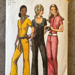 May include: Vintage Simplicity sewing pattern, size 10, featuring three jumpsuit designs. The illustration shows a yellow jumpsuit with a V-neck, a black jumpsuit with a scoop neck, and a red jumpsuit with a zipper front. The pattern includes bust size 32 1/2 inches.