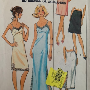May include: A vintage sewing pattern for a slip dress with lace trim. The pattern is for size 10, bust 32 1/2 inches. The pattern includes instructions for making three different styles of slips. The pattern is from the "The Cloth World" brand.