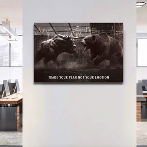 May include: Monochrome artwork showing a bull and a bear, representing the stock market. The image includes the text "TRADE YOUR PLAN NOT YOUR EMOTION" at the bottom of the image.