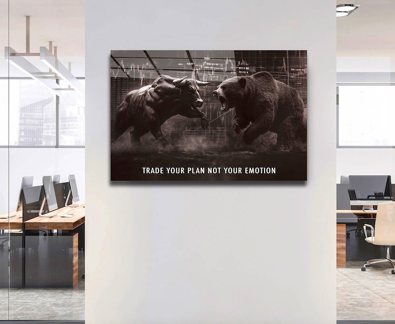 May include: Monochrome artwork showing a bull and a bear, representing the stock market. The image includes the text "TRADE YOUR PLAN NOT YOUR EMOTION" at the bottom of the image.