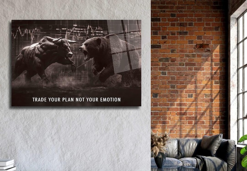 May include: Monochrome artwork showing a bull and a bear in a confrontational pose, set against a backdrop of a city skyline and financial data. The text reads "TRADE YOUR PLAN NOT YOUR EMOTION".