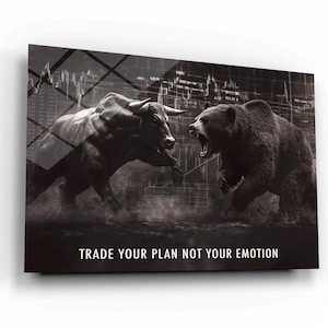 May include: Monochrome artwork showing a bull and a bear in a confrontational pose, with financial data in the background. The text "TRADE YOUR PLAN NOT YOUR EMOTION" is displayed at the bottom. The image is mounted on a white surface.