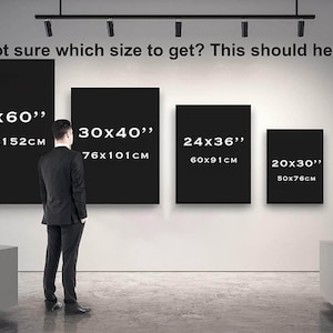 May include: A person in a suit stands in front of a wall with black rectangular art pieces of different sizes. The text above says, "Not sure which size to get? This should help." Sizes are shown in inches and cm, including 40x60", 30x40", 24x36", 20x30", and 16x24".
