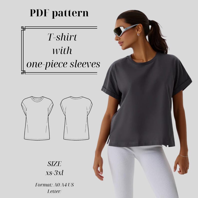 May include: A PDF pattern for a t-shirt with one-piece sleeves. The image shows a woman wearing a dark gray t-shirt with rolled sleeves and white pants. The pattern includes size options from xs to 3xl.